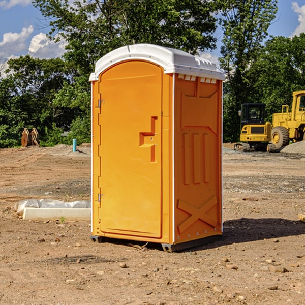 how often are the portable restrooms cleaned and serviced during a rental period in Green County